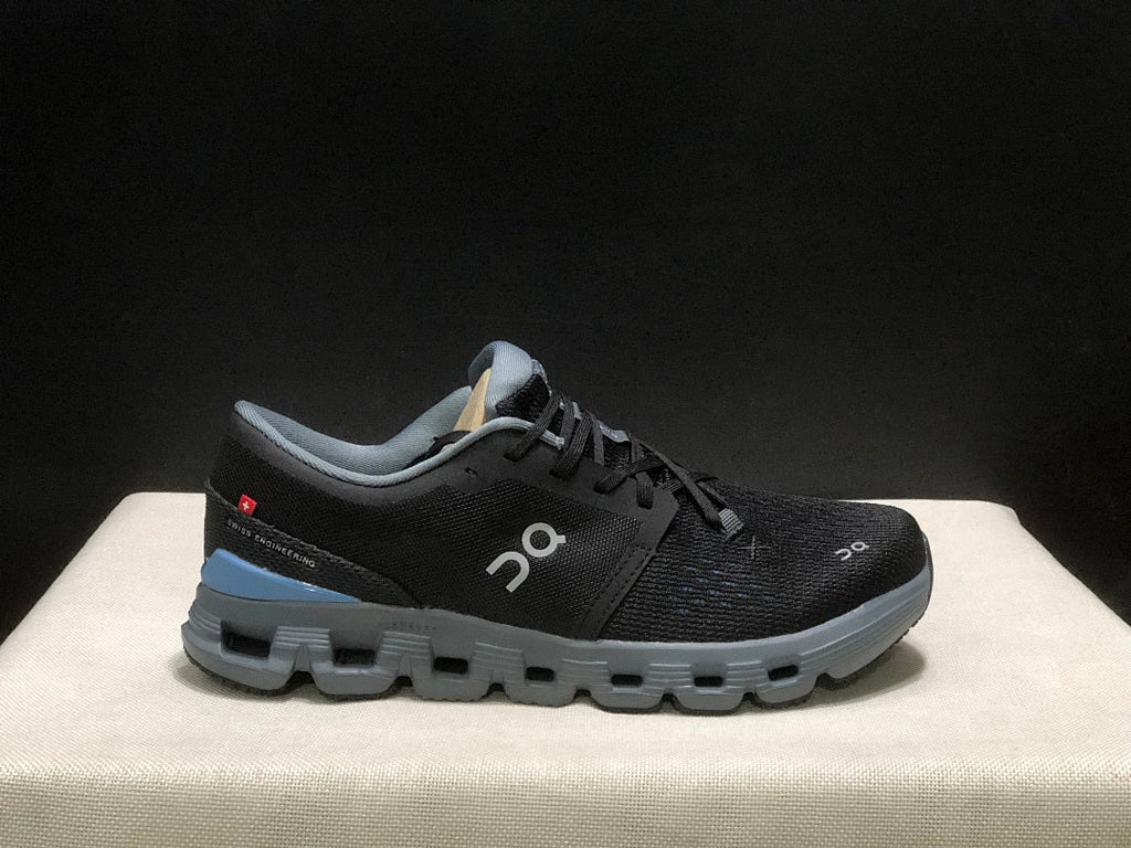 Black and Blue On Cloud X 4 Sneakers - product image from the listing.
