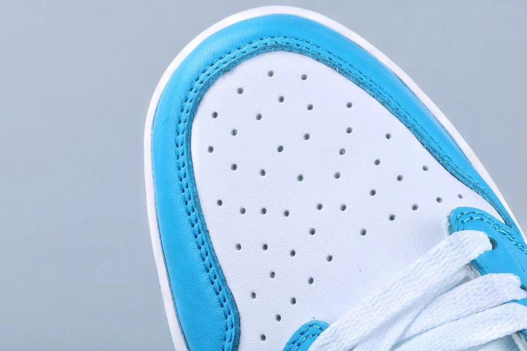 UNC Blue and White Sneakers 401 - Jordan 1 Low SB - product image from the listing.
