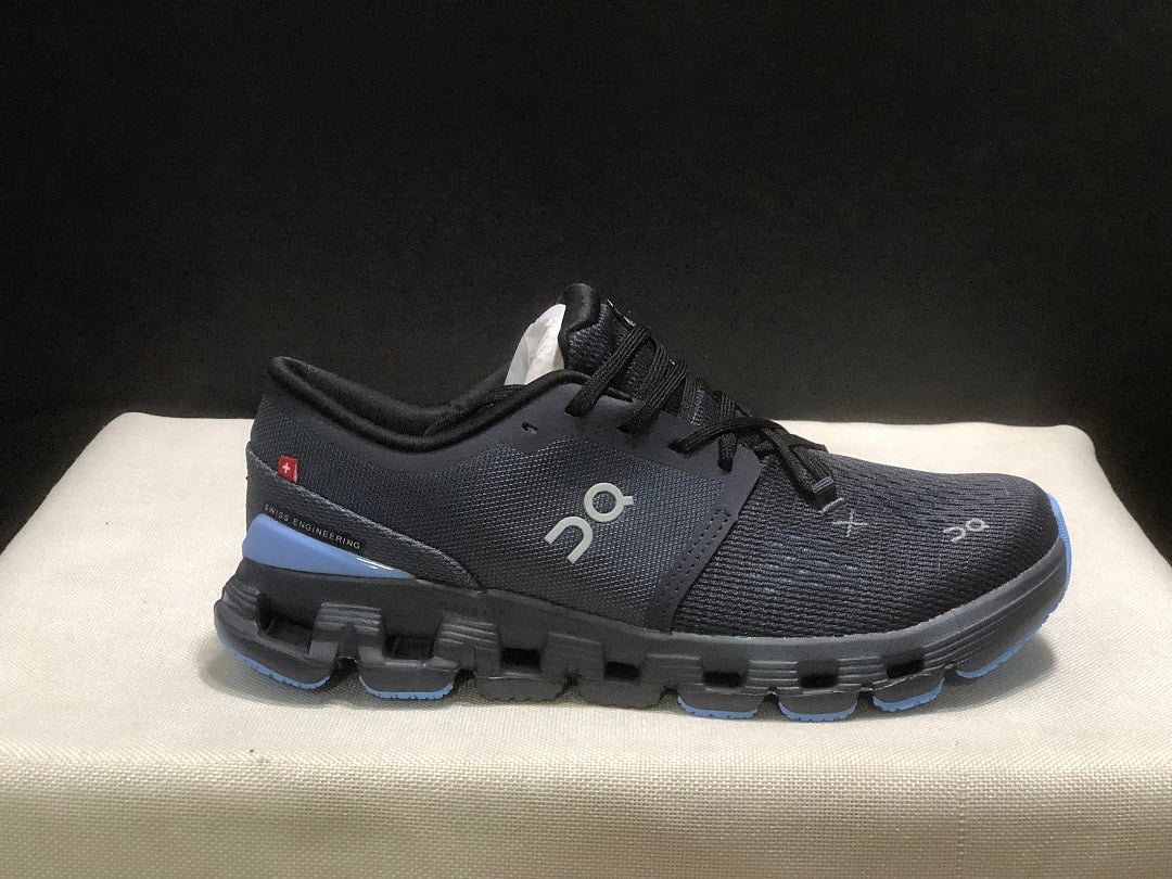 On Cloud X 4 Running Sneakers in Navy - product image from the listing.