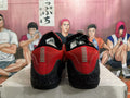 Nike Red and Black Low-Cut Basketball Shoes - product image from the listing.