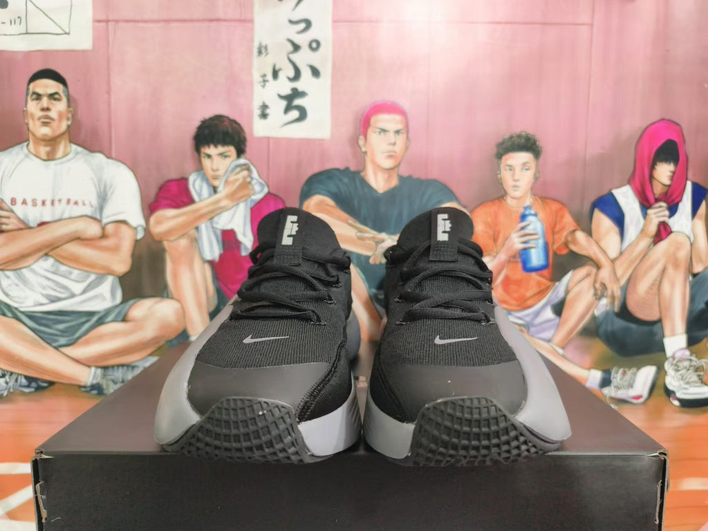 Nike Basketball Sneakers in Black and Grey - product image from the listing.