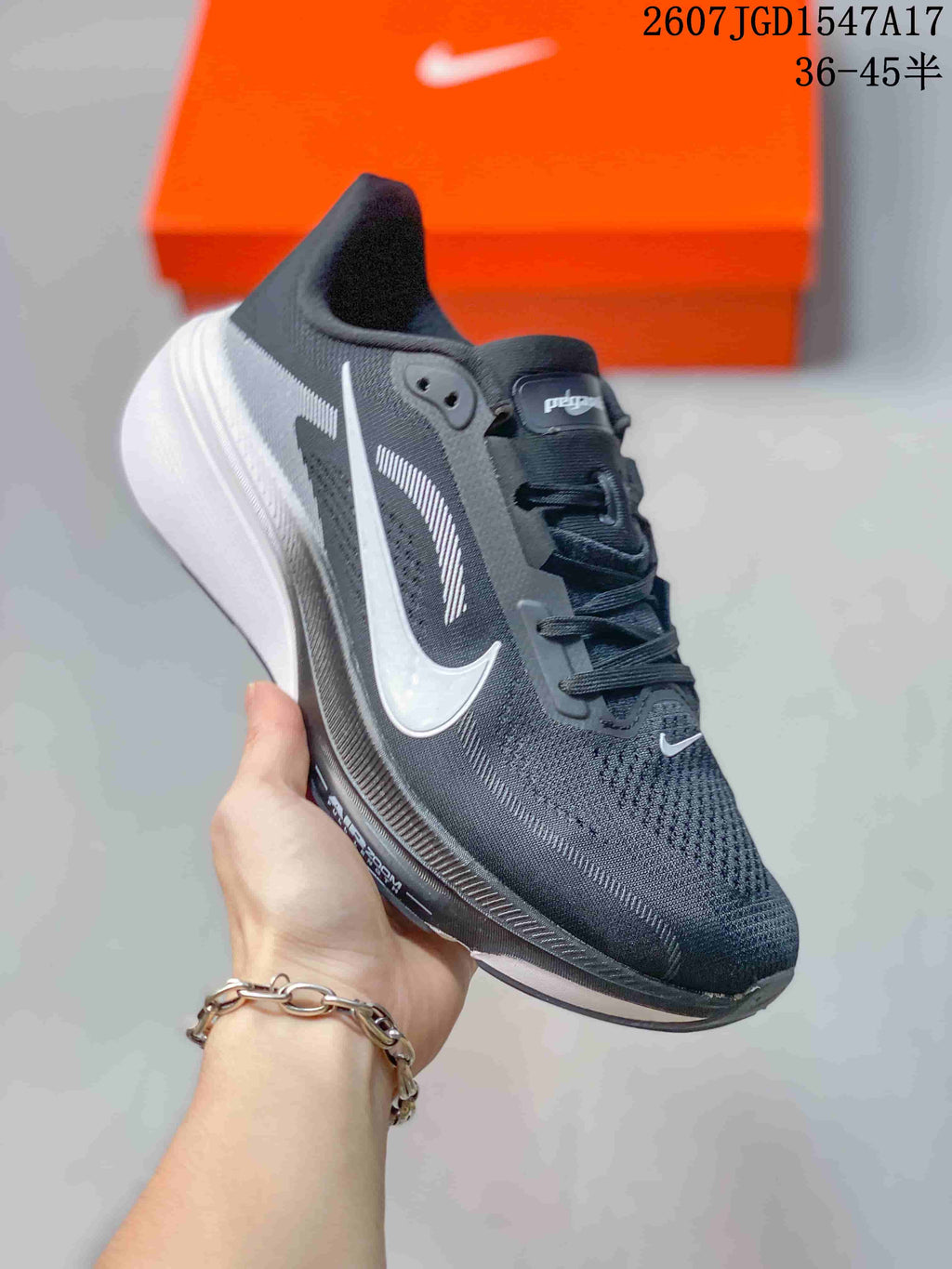Nike Air Zoom Pegasus 42 Running Sneakers in Black White - product image from the listing.