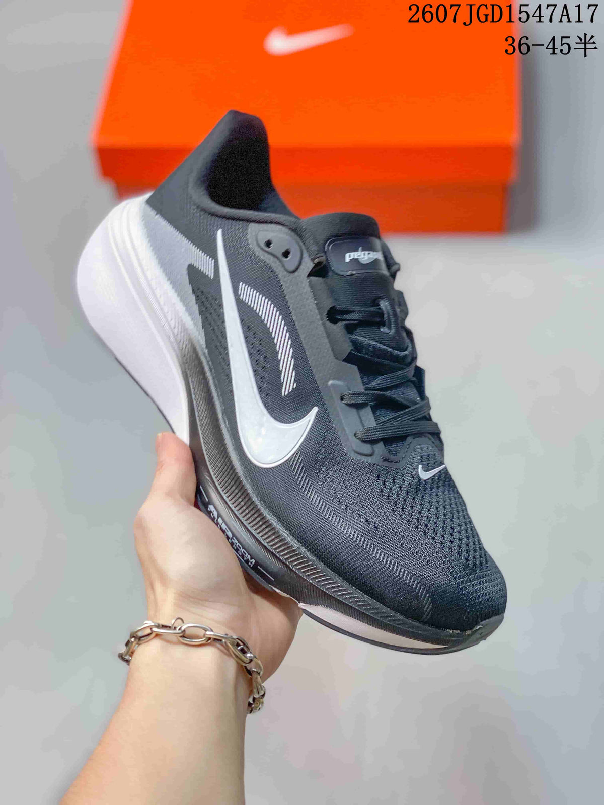 Nike Air Zoom Pegasus 42 Running Sneakers in Black White - product image from the listing.