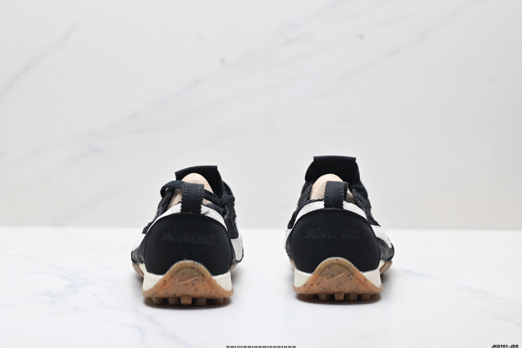 Jacquemus x Nike Jacumoon Sneakers in Black and White - product image from the listing.