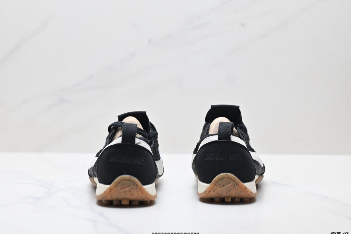 Jacquemus x Nike Jacumoon Sneakers in Black and White - product image from the listing.