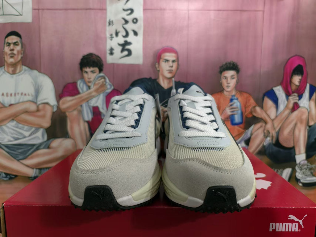 White and Navy PUMA Rider Elite Sneakers - product image from the listing.