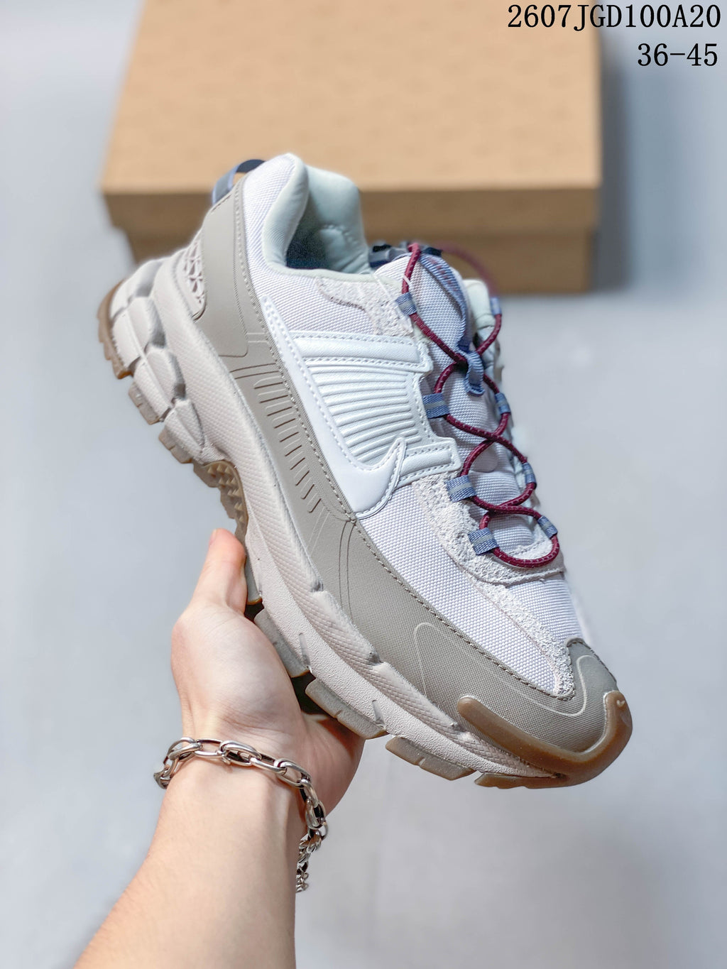 Nike Zoom Vomero Roam Sneakers in White Grey 2607TGD100A20 - product image from the listing.
