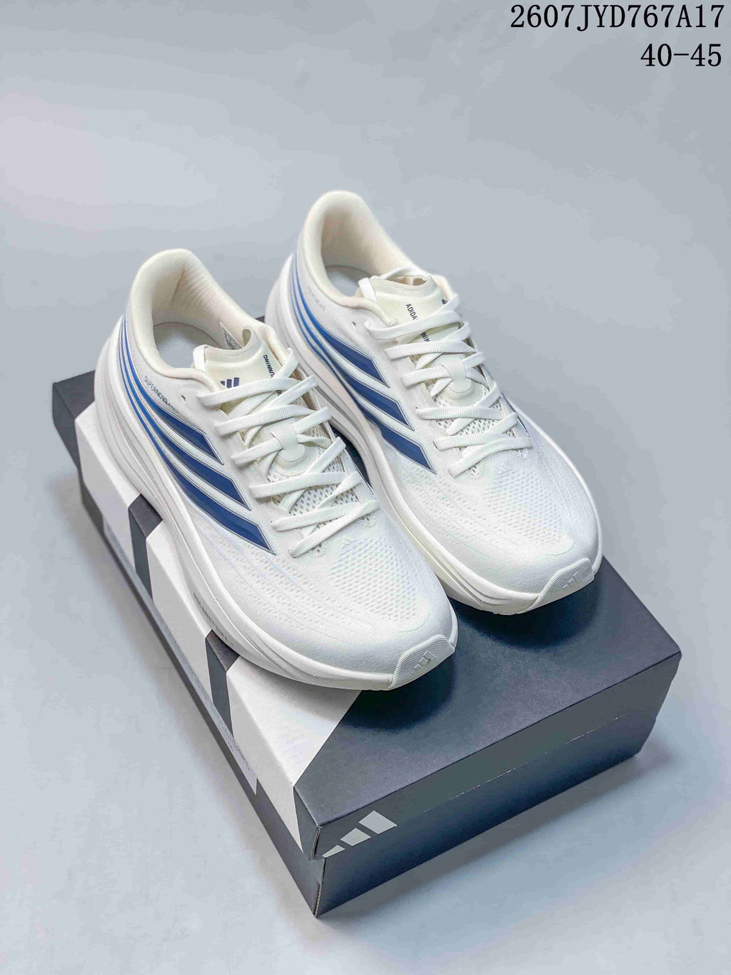 Adidas Supernova Rise 4 M Sneakers in White Blue - product image from the listing.