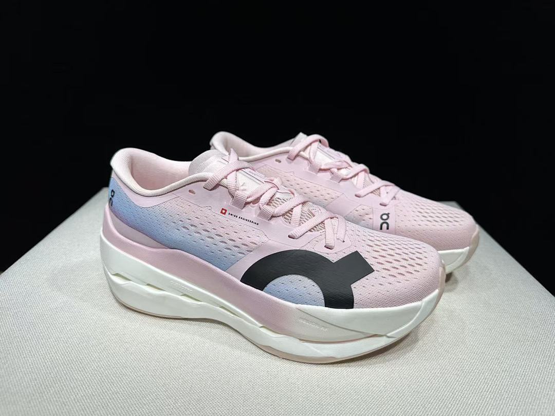 Pink and Blue On Cloudboom Max Running Shoes - product image from the listing.