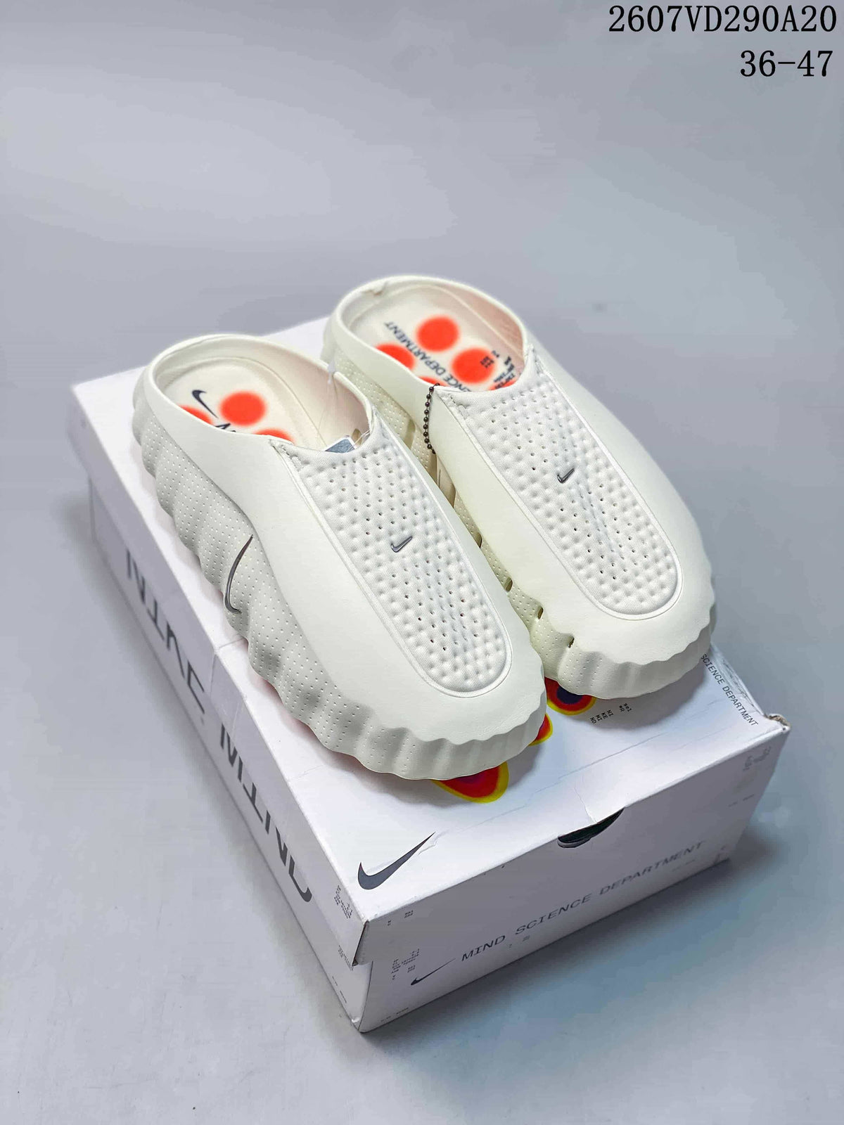 Mind 001 Covered-Toe Slides Slip-On Sandals by Nike - product image from the listing.