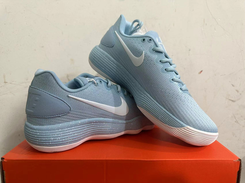 Nike Basketball Footwear in Blue with White Swoosh - product image from the listing.