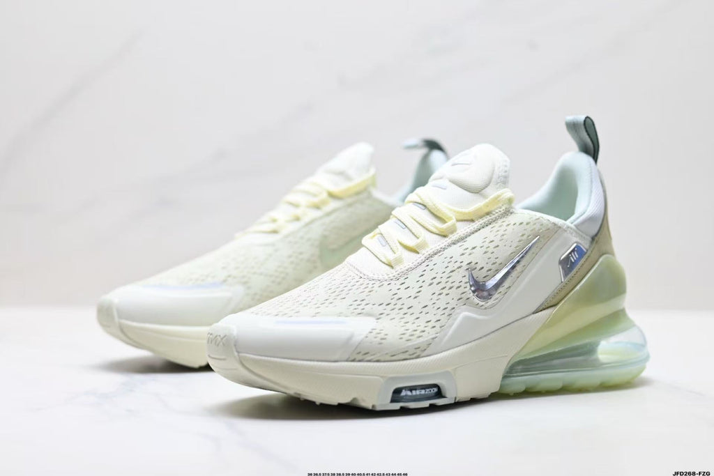 Light Green and White Nike Air Zoom Sneakers - product image from the listing.