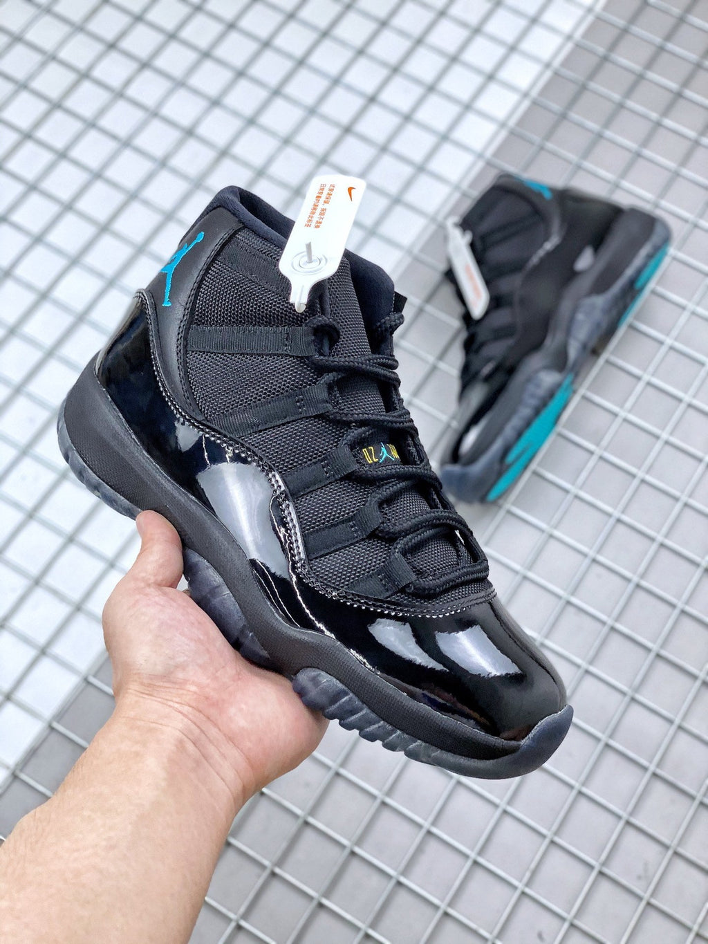 Air Jordan 11 Retro Gamma Black Sneakers 378037-006 - product image from the listing.