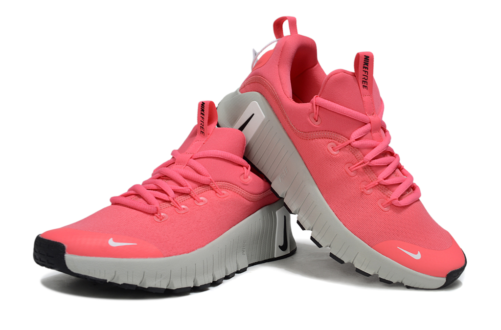Coral Pink and Gray Nike Free Metcon 5 Sneakers - product image from the listing.