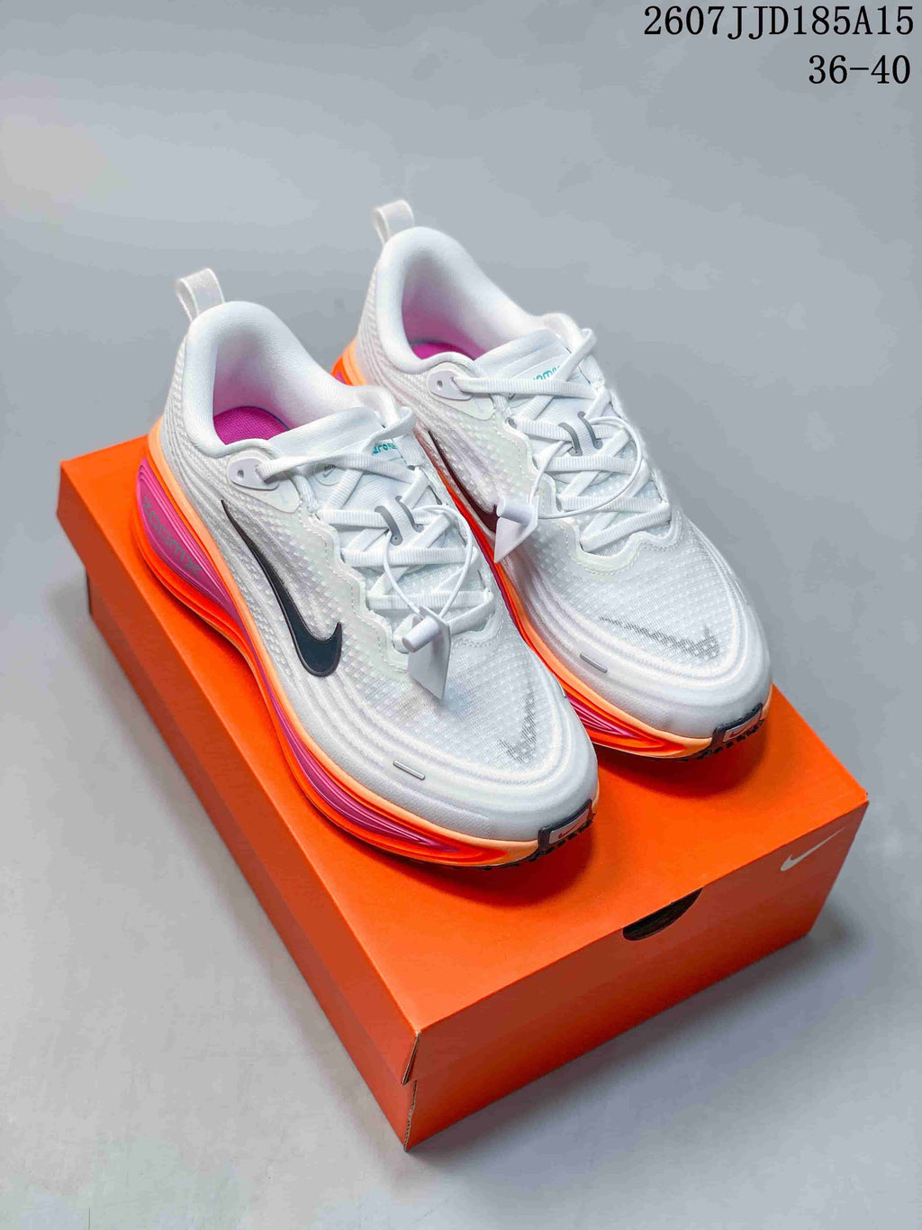 Nike Vomero Plus Running Shoes in White Orange Pink 2607JJD185A15 - product image from the listing.