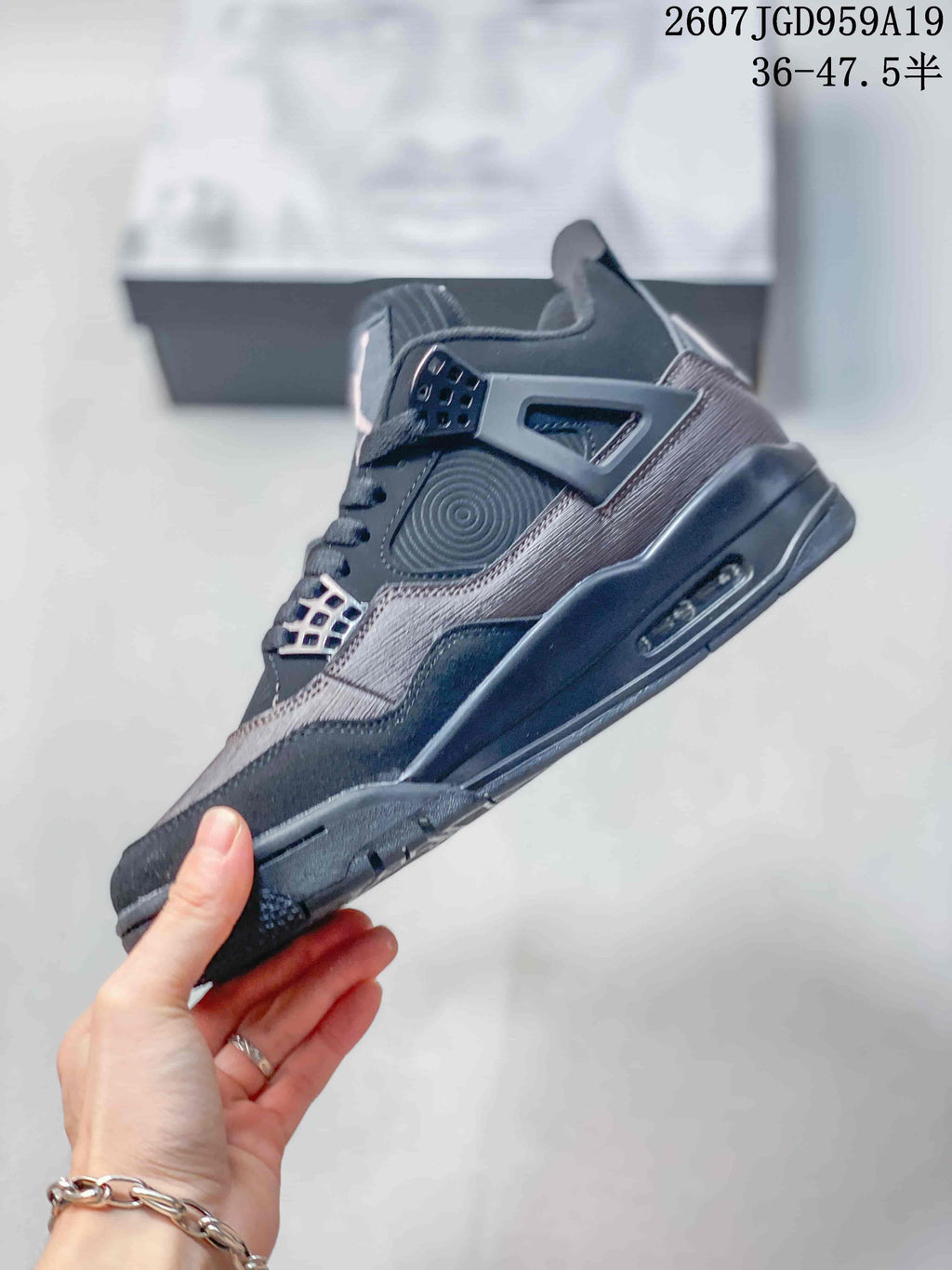 Air Jordan 4 Retro Dark Gray Sneakers JA8136 - product image from the listing.