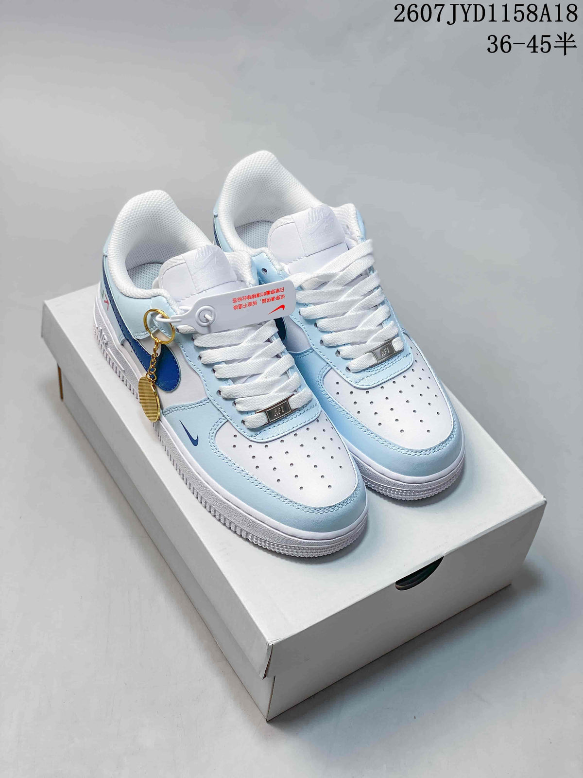 Nike Air Force 1 '07 Low Sneakers, in White and Light Blue - product image from the listing.