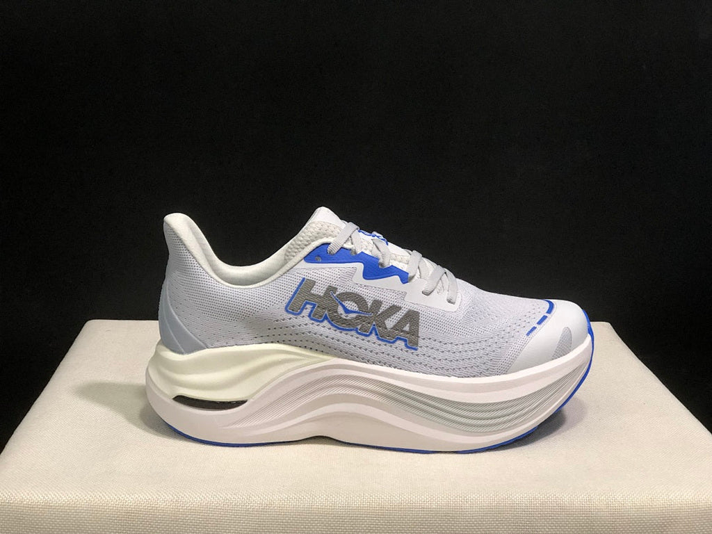 White and Blue HOKA Skyward X Running Shoes - product image from the listing.
