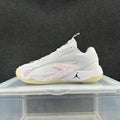 Jordan Low-Top Sneakers in White and Pink - product image from the listing.