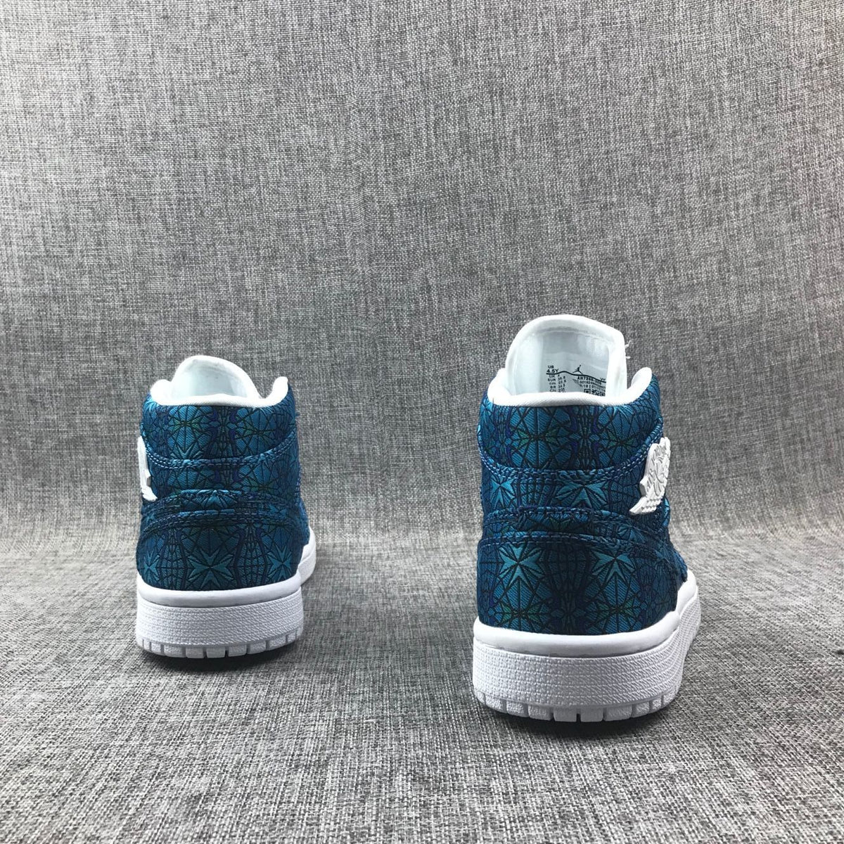 Women's Air Jordan 1 Mid Blue Pattern Sneakers AH7389-300 - product image from the listing.