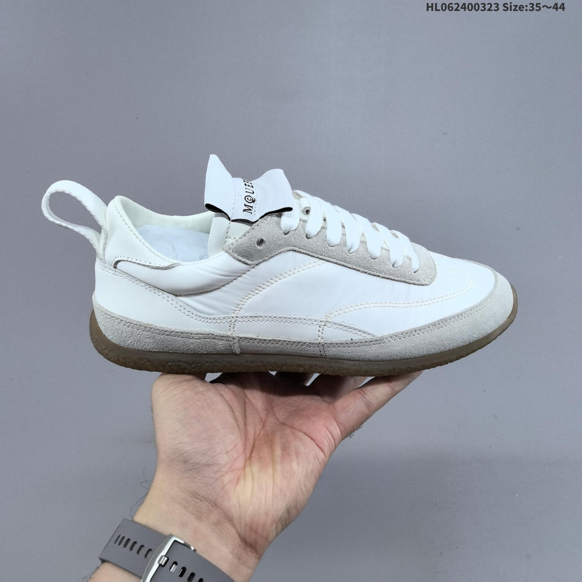 Alexander McQueen EC1 Low-Cut Lace-Up Sneakers - product image from the listing.