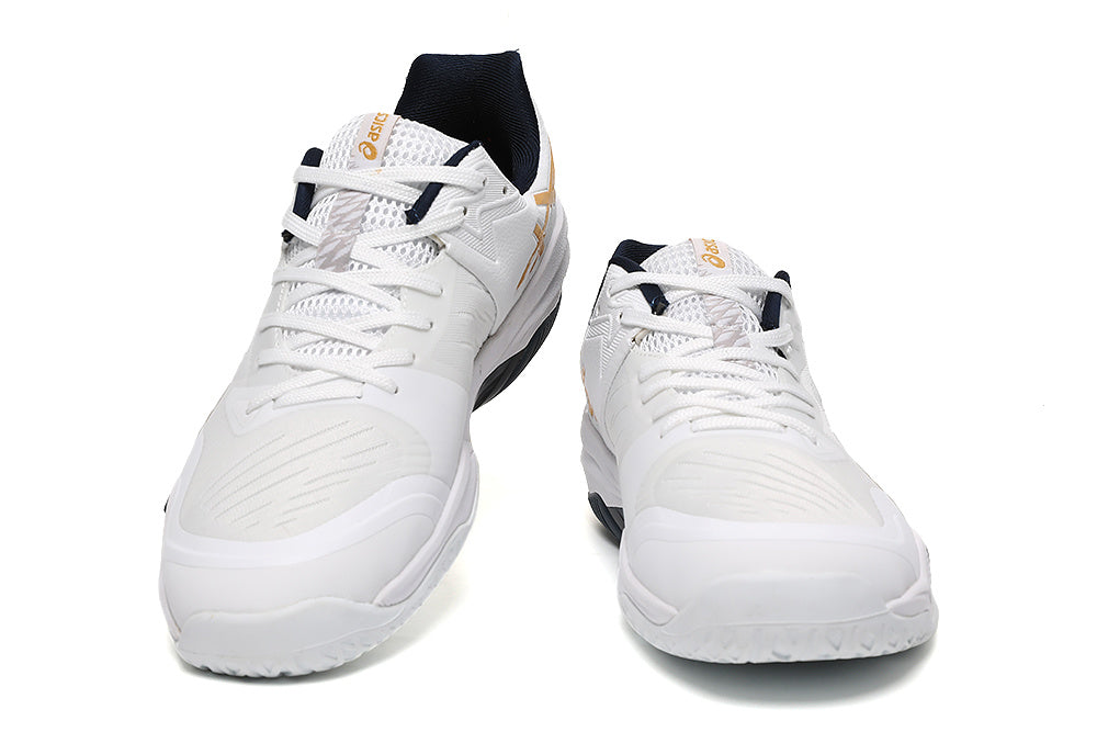 ASICS Court Shoes in White Gold Navy - product image from the listing.