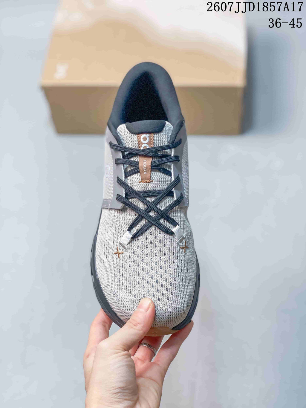 On Cloud X 4 Sneakers in Gray Black 2607JJD1857A17 - product image from the listing.