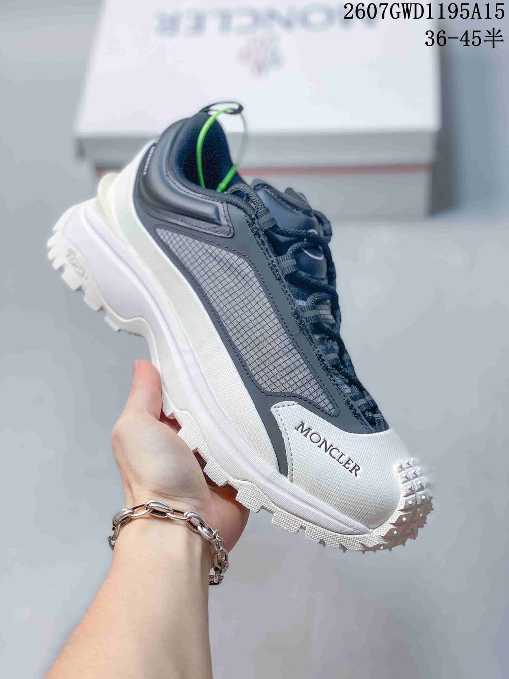 Moncler Trailgrip Lite2 Sneakers in White Black 2607GWD1195A15 - product image from the listing.