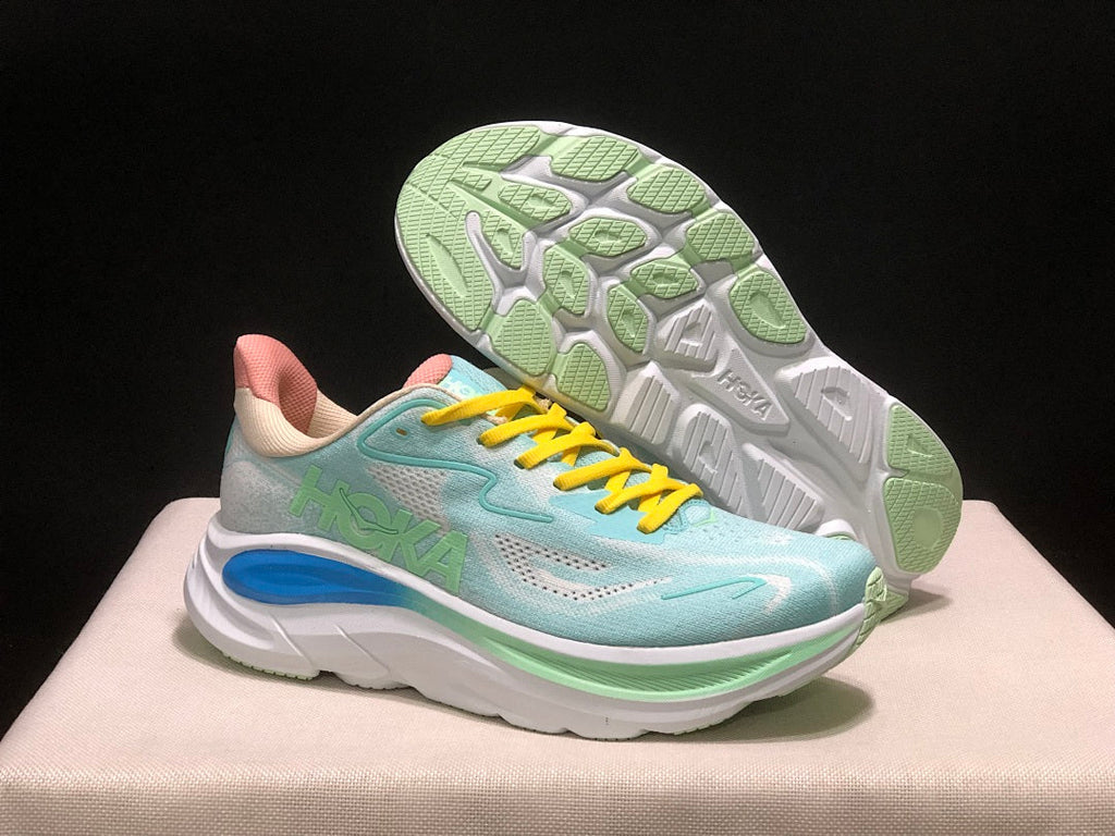 Aqua and Yellow HOKA Clifton 10 Running Shoes - product image from the listing.