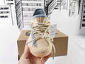 Yeezy 350 V2 Kids Sneakers in Linen in Yellow - product image from the listing.