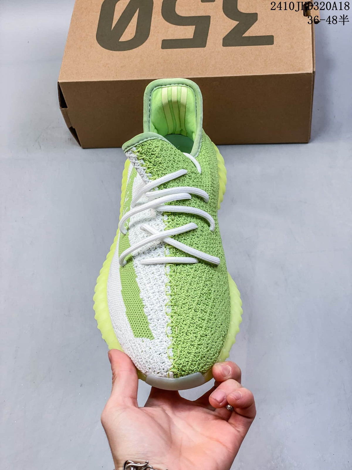 Adidas Yeezy Boost 350 V2 Sneakers in Green White - product image from the listing.