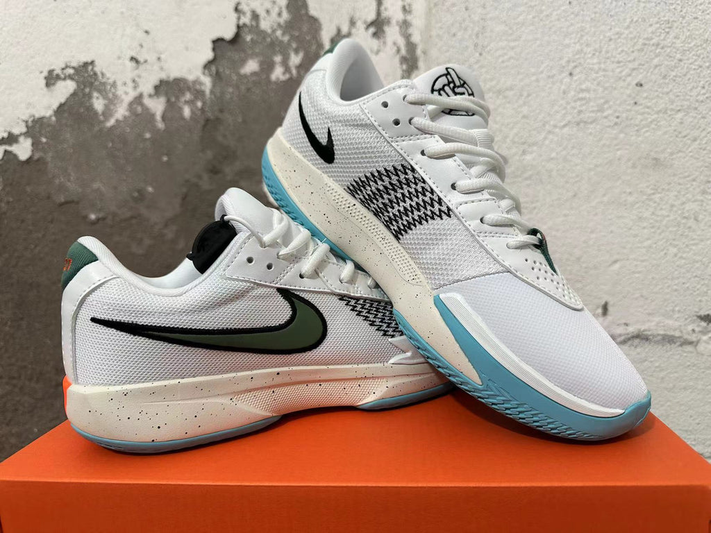 Nike G.T. Cut Academy Basketball Shoes, in White and Green - product image from the listing.