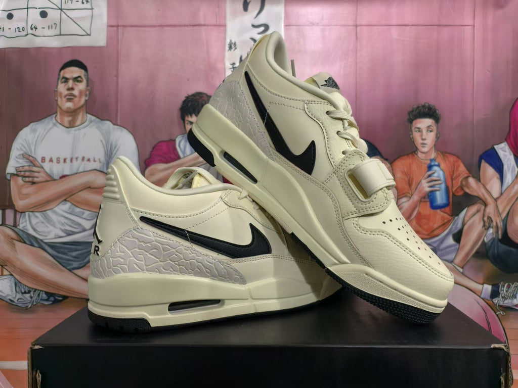 Cream and Black Jordan Legacy 312 Low Sneakers - product image from the listing.