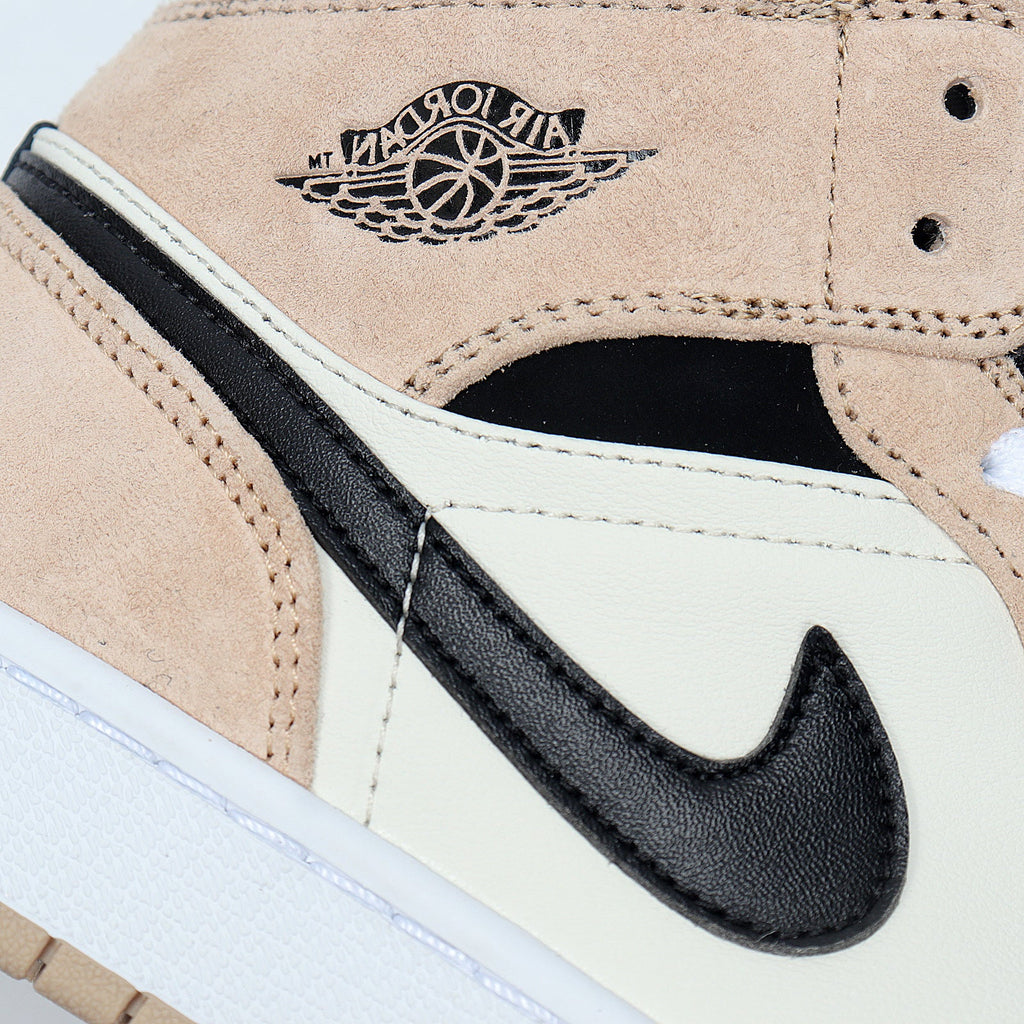 Jordan 1 Low BQ6472-800 Sneakers in Tan and Black - product image from the listing.
