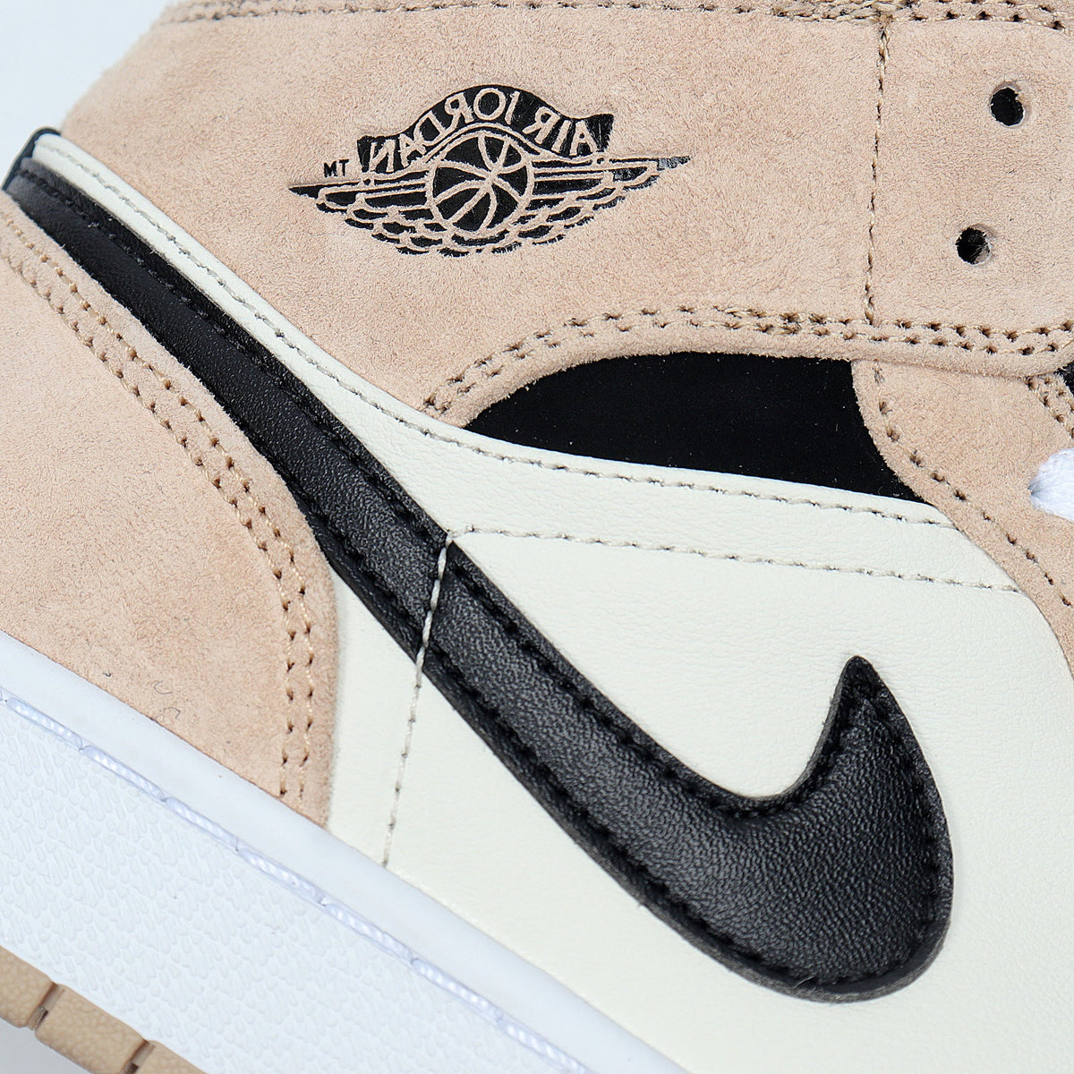 Jordan 1 Low BQ6472-800 Sneakers in Tan and Black - product image from the listing.
