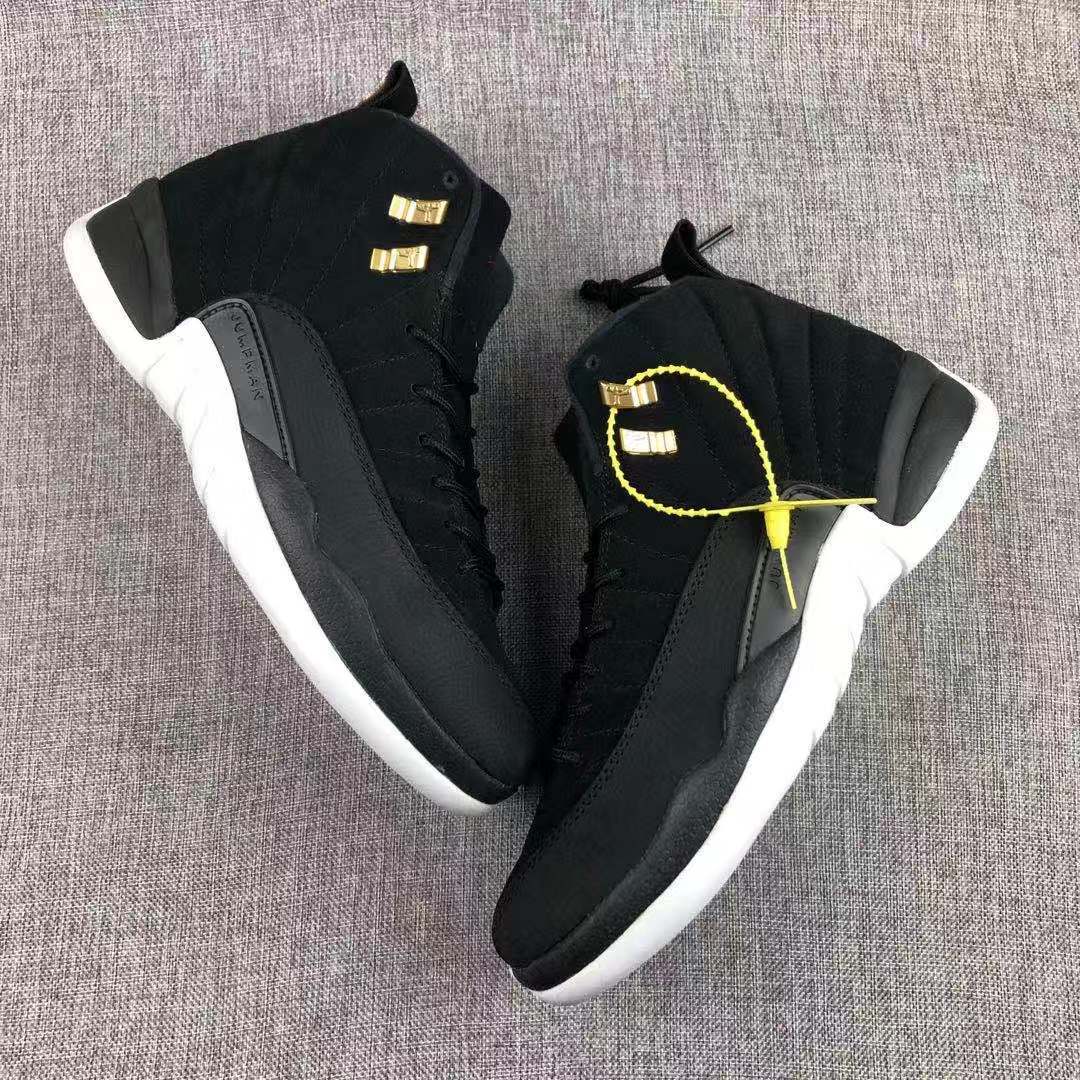 Air Jordan 12 Black Gold Sneakers 130690-017 - product image from the listing.