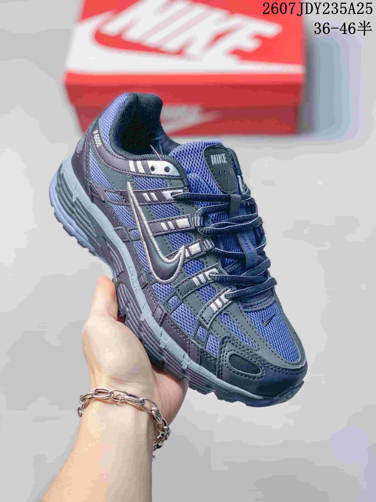 Nike P-6000 Trainers in Gray and White Colorways - product image from the listing.