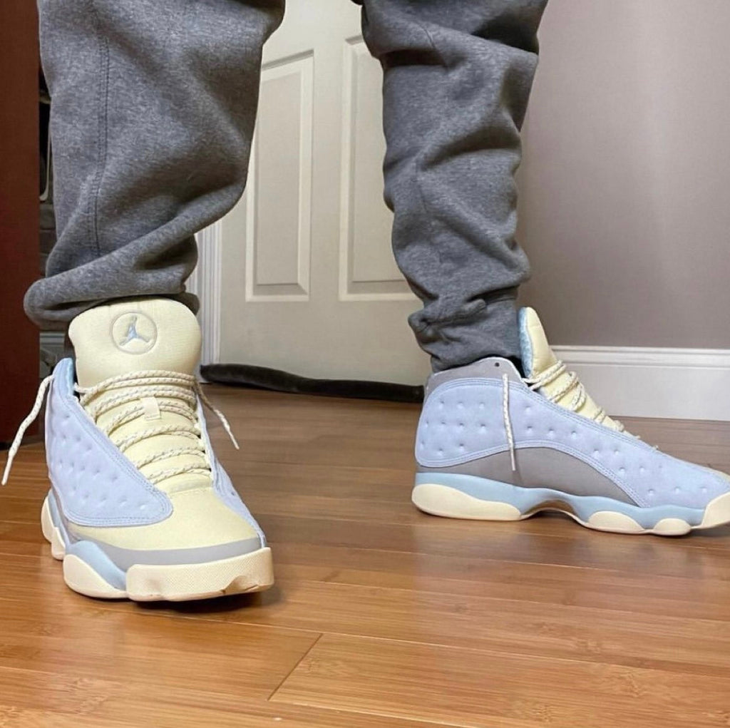 Blue and Cream Jordan 13 SoleFly DX5763-100 Sneakers - product image from the listing.