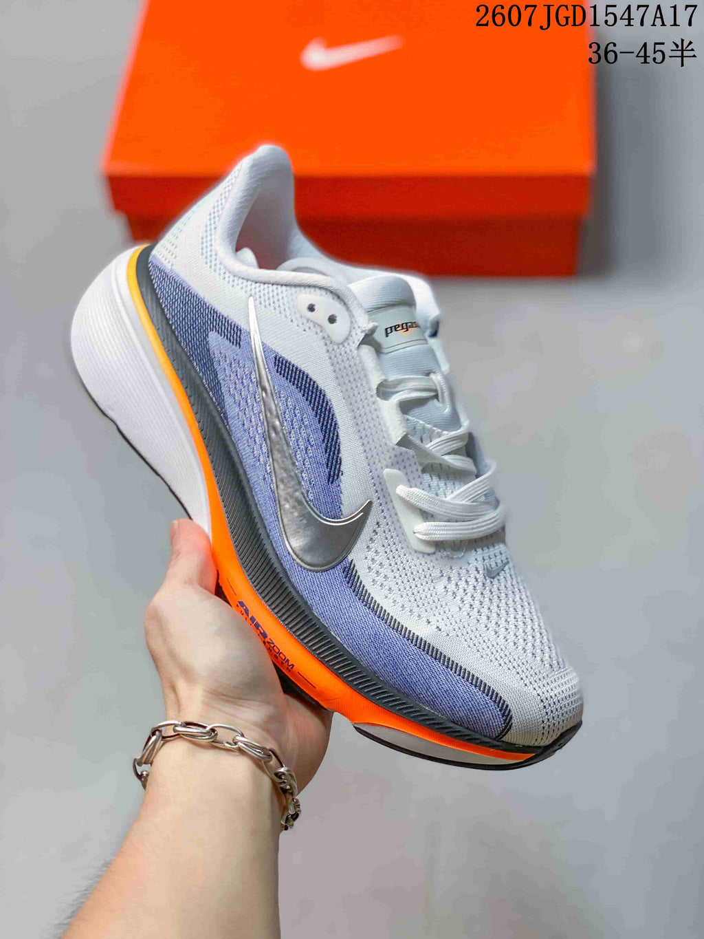 Nike Air Zoom Pegasus 42 Running Shoes in White Blue Orange - product image from the listing.
