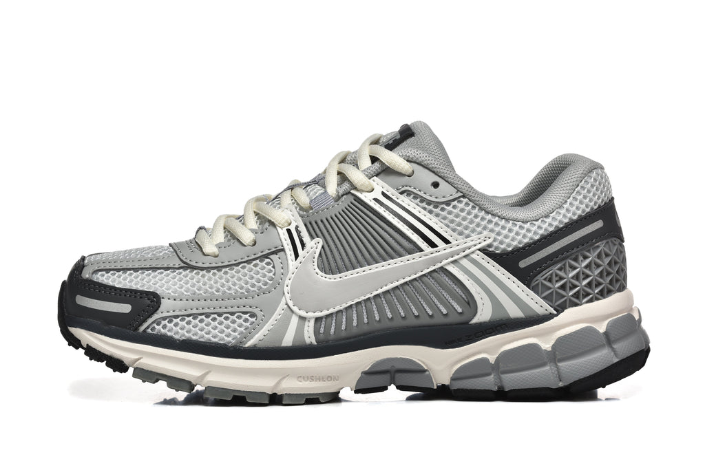 Grey and White Nike Zoom Vomero 5 Sneakers - product image from the listing.