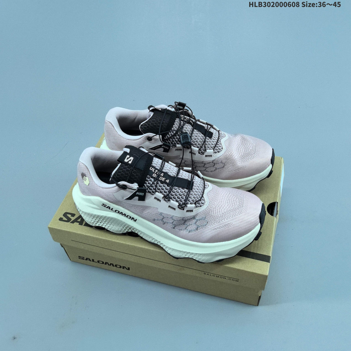 Salomon Ultra Glide 4 Trail Running Shoes, in Pink and Cream - product image from the listing.