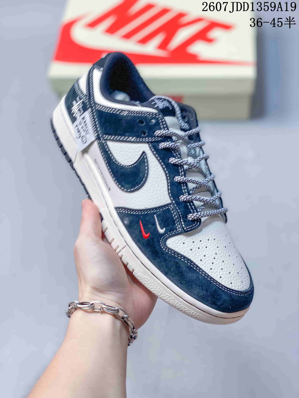Air Jordan 1 Low Navy White Sneakers 2607JDD1359A19 - product image from the listing.
