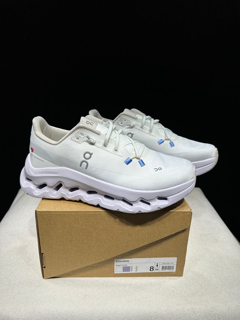On Cloudtilt Trainers in White and Lavender - product image from the listing.