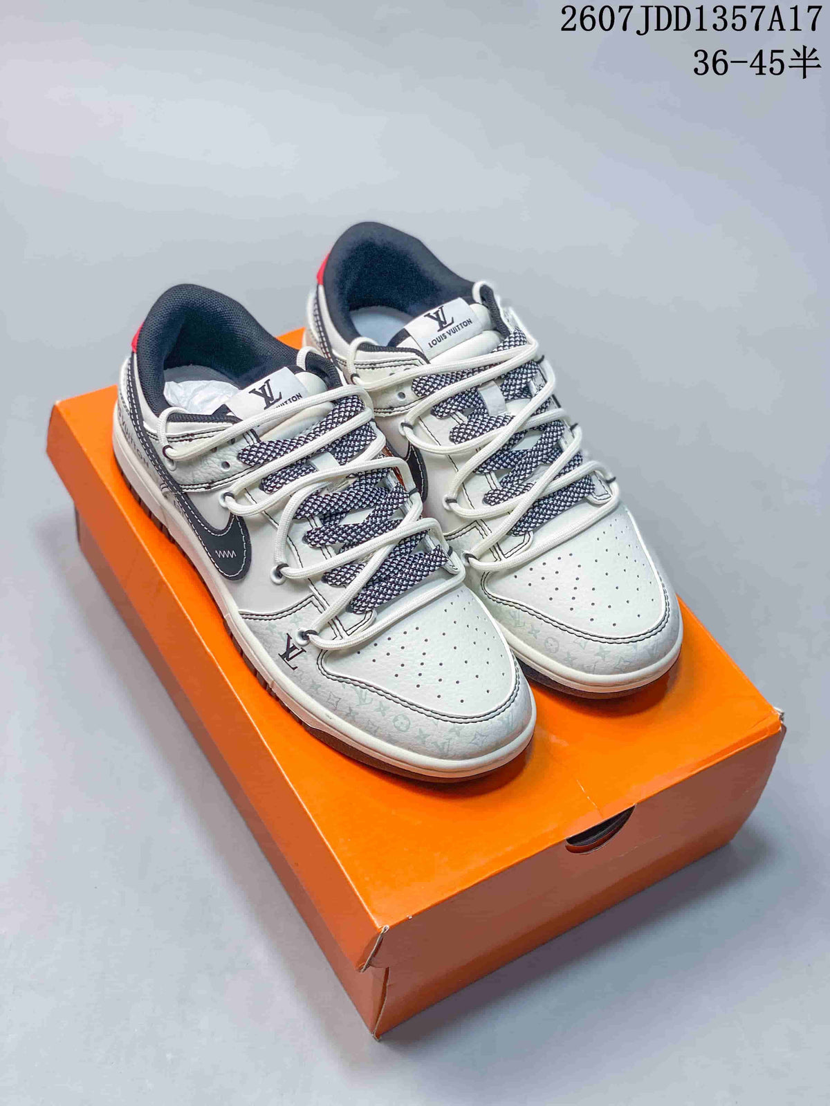 Nike SB Dunk Low White Black Double-Strap Trainers - product image from the listing.