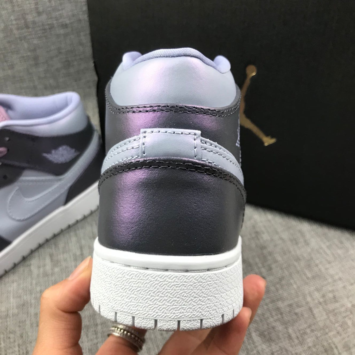 Jordan 1 Mid Sneakers in Purple AV5174-400 - product image from the listing.