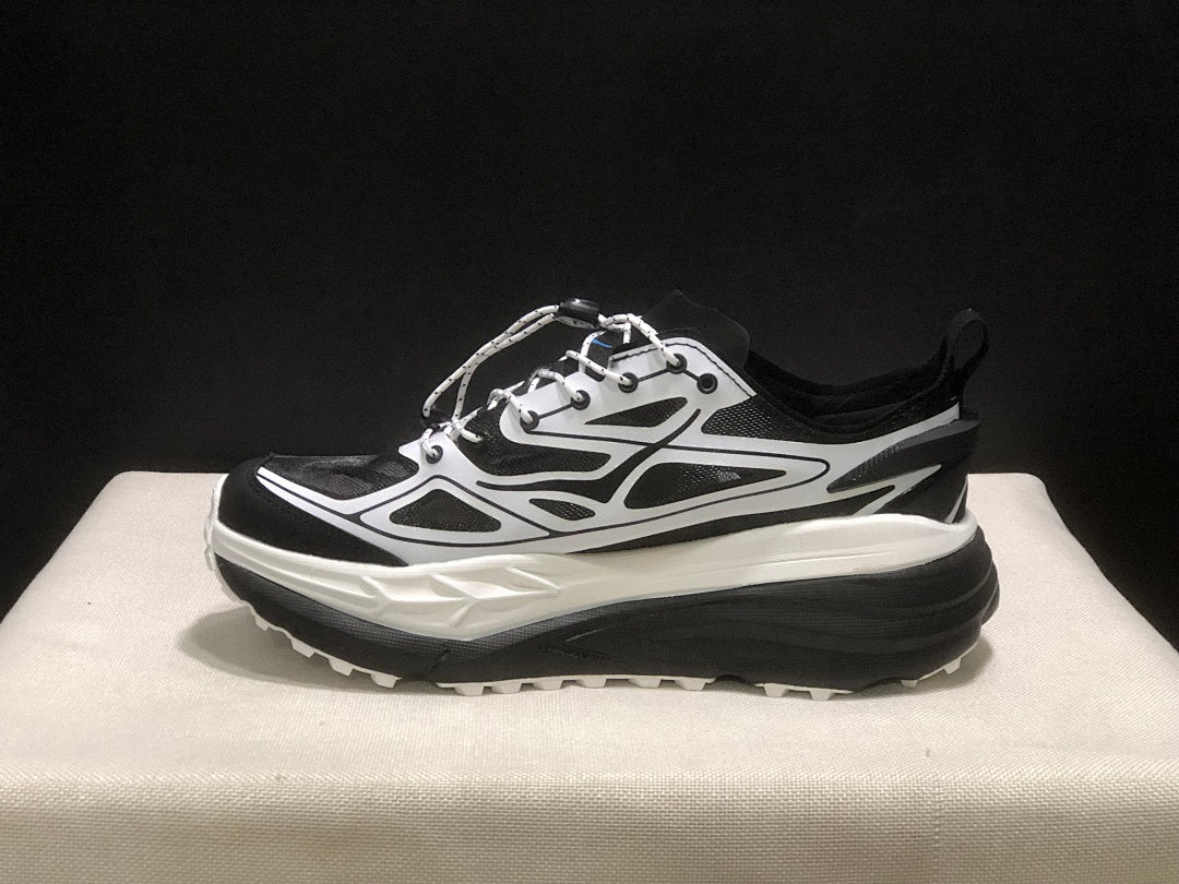 HOKA Stinson One 7 Black and White Trail Trainers - product image from the listing.