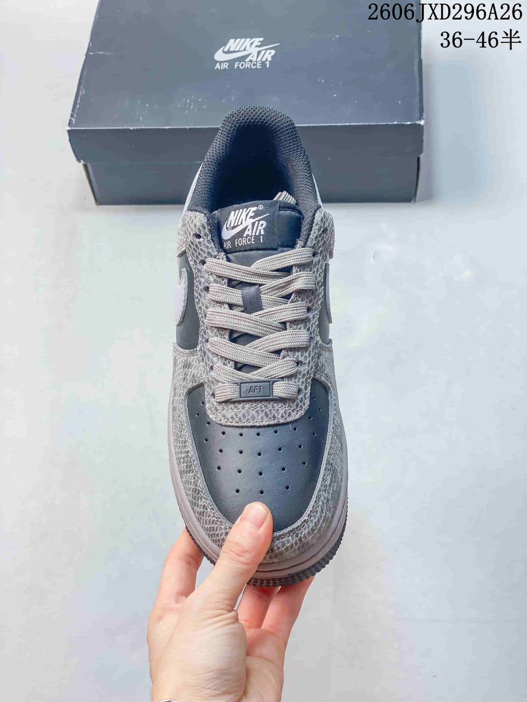 Nike Air Force 1 '07 Low-Top Sneakers in Grey White - product image from the listing.