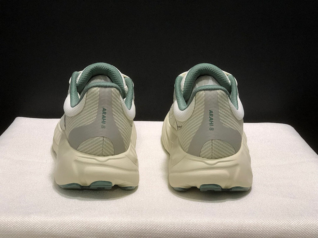 HOKA Arahi 8 Shoes for Running in Cream and Sage - product image from the listing.