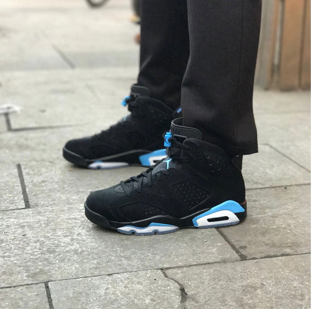 Air Jordan 6 UNC Black and University Blue Sneakers - product image from the listing.