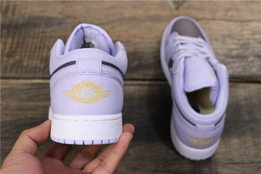 Air Jordan 1 Low Oxygen Sneakers in Purple 554723-505 - product image from the listing.